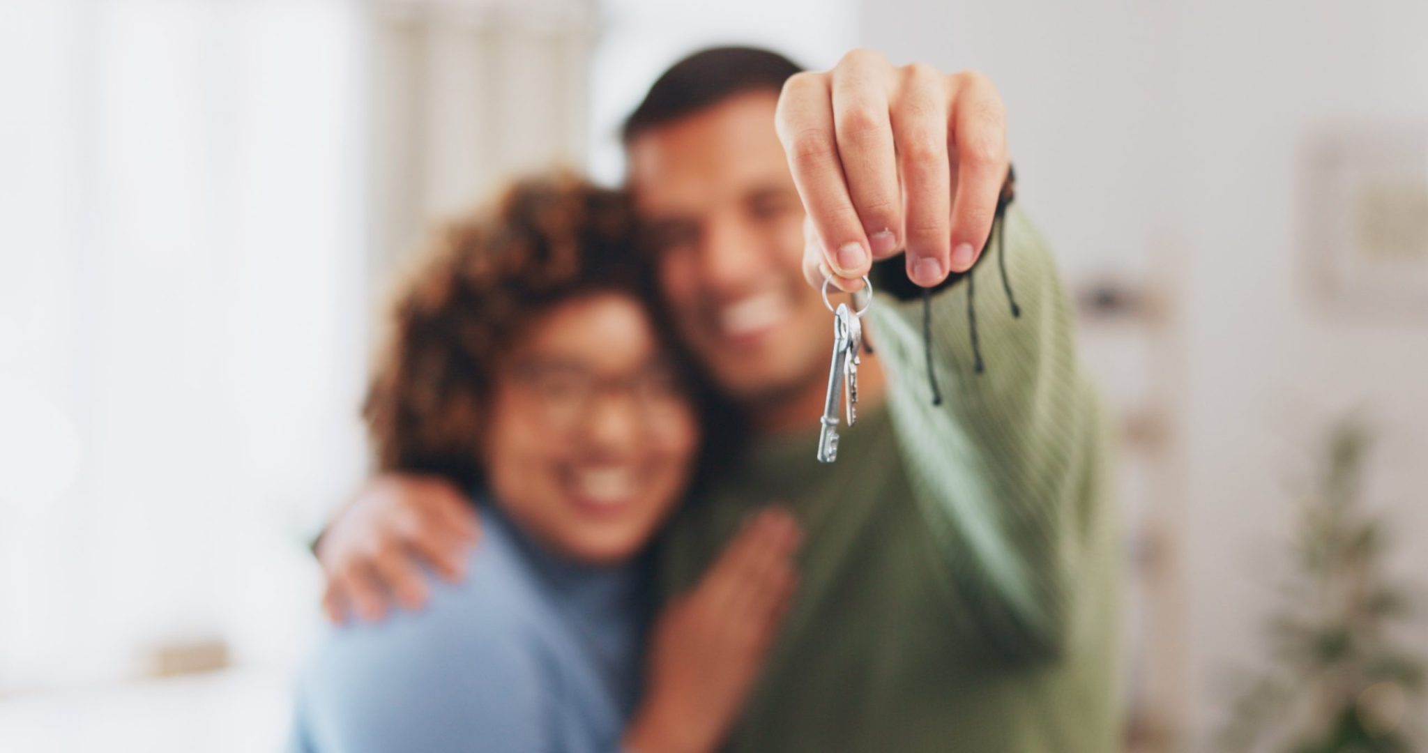 Hand, Keys And A Home Owner Couple Proud Of Their Real Estate Property Investment